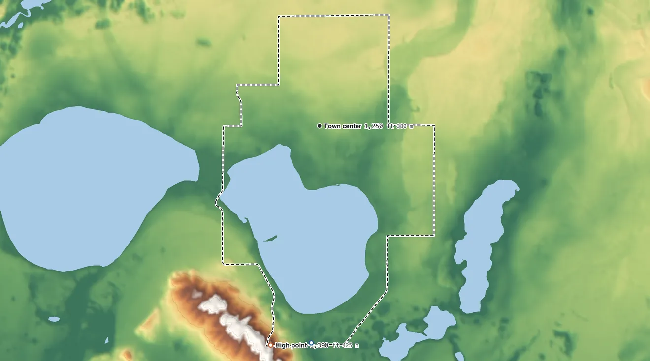 Topographic elevation map of Lewiston, Michigan, shaded from 1,220 ft on the south side to 1,390 ft on the south edge, below higher ground just outside