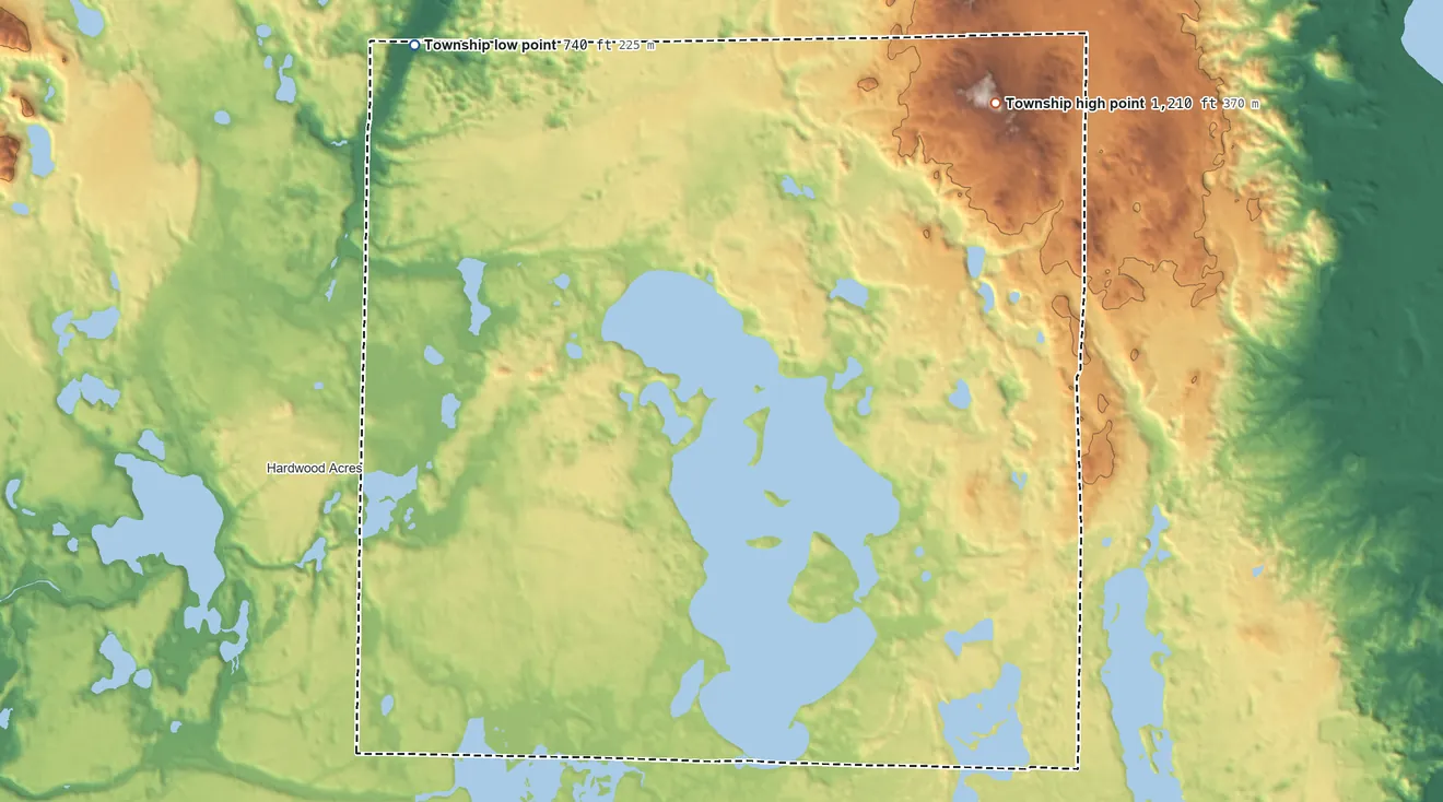 Topographic elevation map of Long Lake Township, Michigan, shaded from 740 ft on the northwest side to 1,210 ft on the northeast side