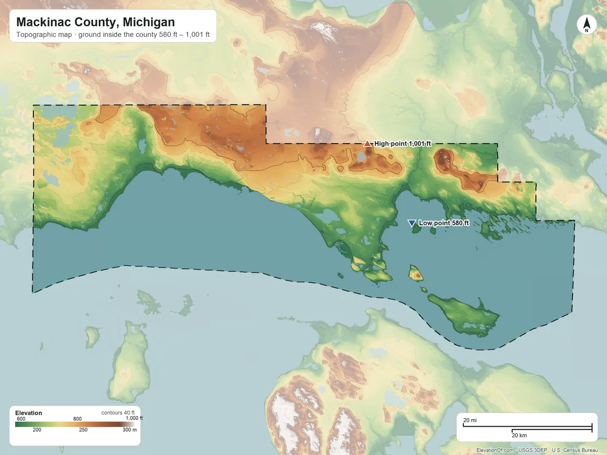 Topographic elevation map of Mackinac County, Michigan, shaded from 580 ft on the east side to 1,001 ft on Maple Hill
