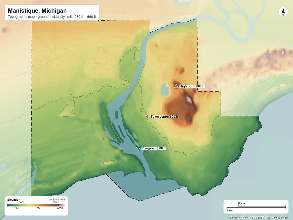 Topographic elevation map of Manistique, Michigan, shaded from 580 ft on the shore of Lake Michigan to 660 ft on the northeast side