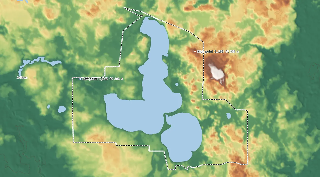 Topographic elevation map of Manitou Beach-Devils Lake, Michigan, shaded from 1,040 ft on the west side to 1,160 ft on the northeast side