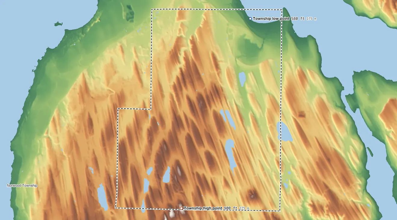 Topographic elevation map of Marion Township, Charlevoix County, Michigan, shaded from 580 ft on the north side to 900 ft on the southwest side