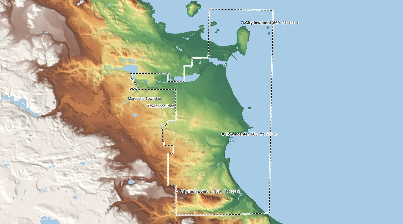 Topographic elevation map of Marquette, Michigan, shaded from 600 ft on the north side to 1,180 ft on the southwest side