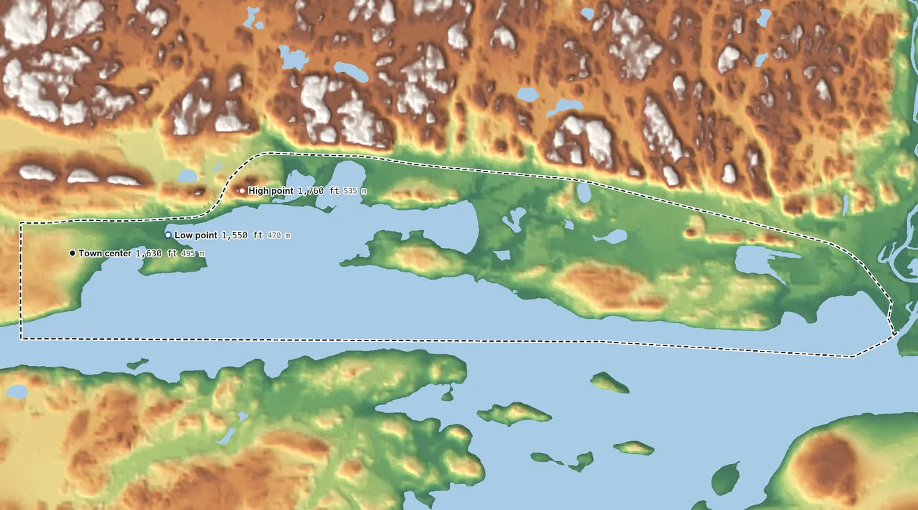 Topographic elevation map of Michigamme, Michigan, shaded from 1,550 ft on the east side to 1,760 ft on the east side