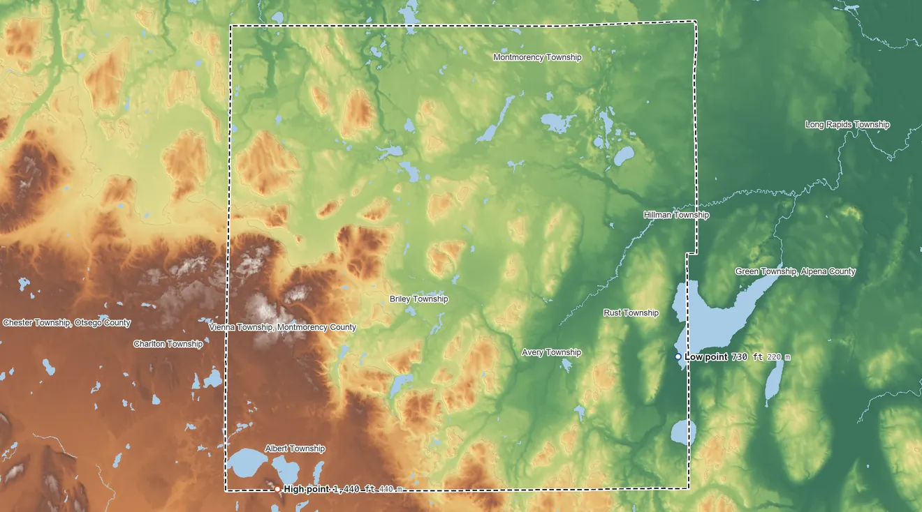 Topographic elevation map of Montmorency County, Michigan, shaded from 730 ft on the southeast side to 1,440 ft on Comstock Hills