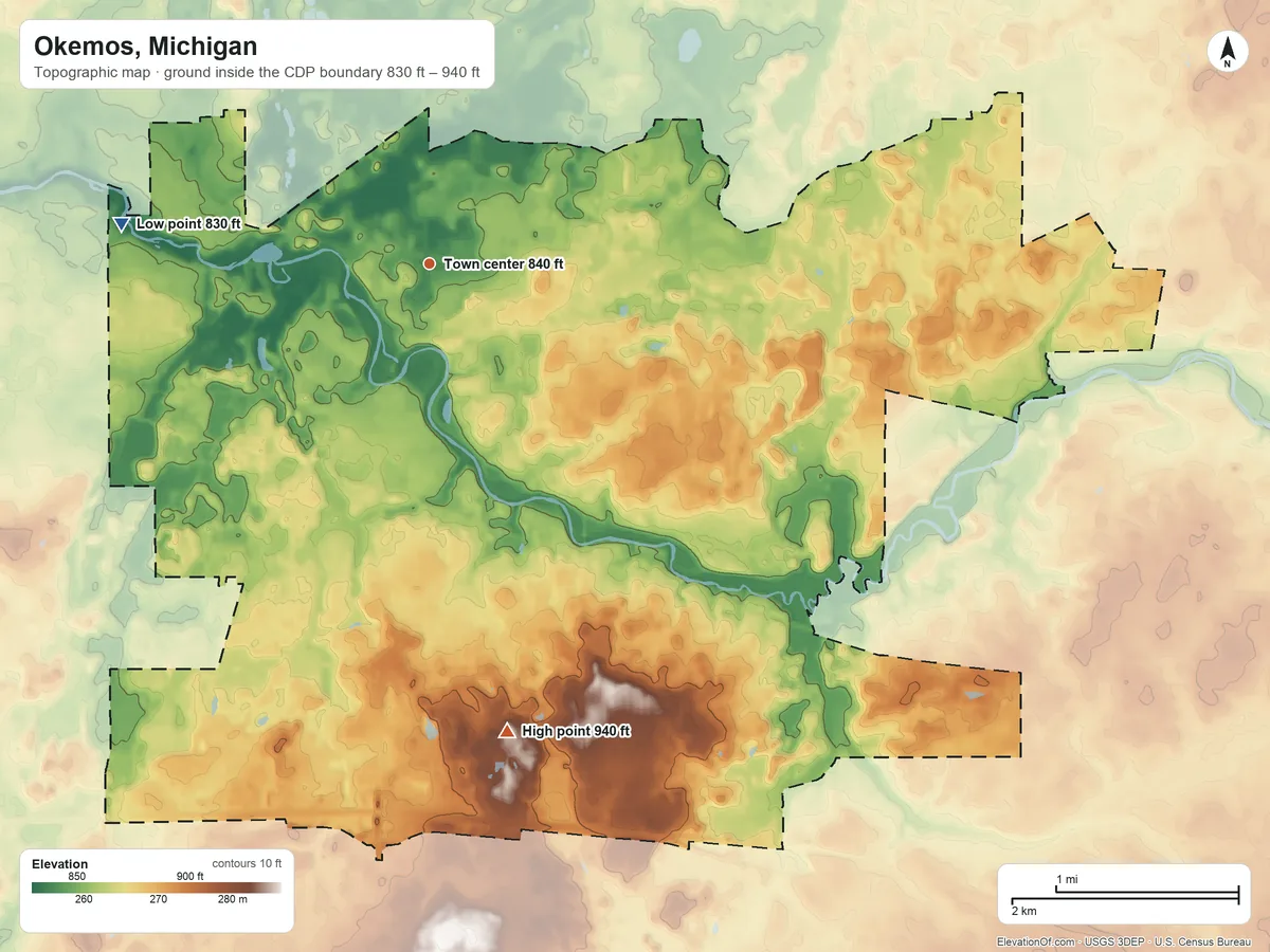 Topographic elevation map of Okemos, Michigan, shaded from 830 ft on the west side to 940 ft on the south side
