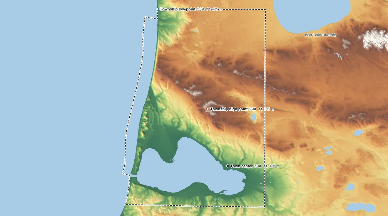 Topographic elevation map of Onekama Township, Michigan, shaded from 580 ft on the northwest side to 990 ft on the north side