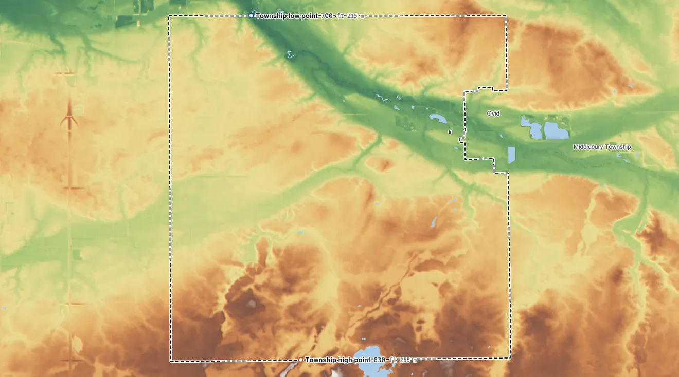 Topographic elevation map of Ovid Township, Clinton County, Michigan, shaded from 700 ft on the northwest side to 830 ft on the south side