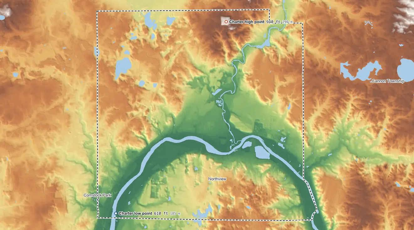 Topographic elevation map of Plainfield Township, Michigan, shaded from 610 ft on the southwest side to 940 ft on the north side