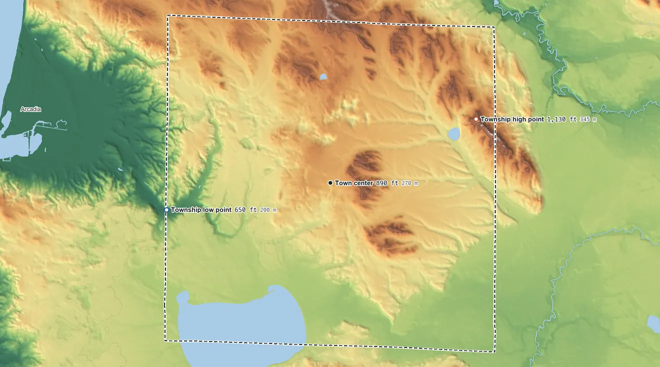 Topographic elevation map of Pleasanton Township, Michigan, shaded from 650 ft on the west side to 1,130 ft on the northeast side