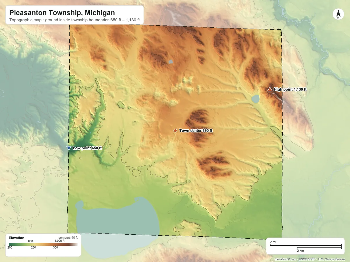 Topographic elevation map of Pleasanton Township, Michigan, shaded from 650 ft on the west side to 1,130 ft on the northeast side