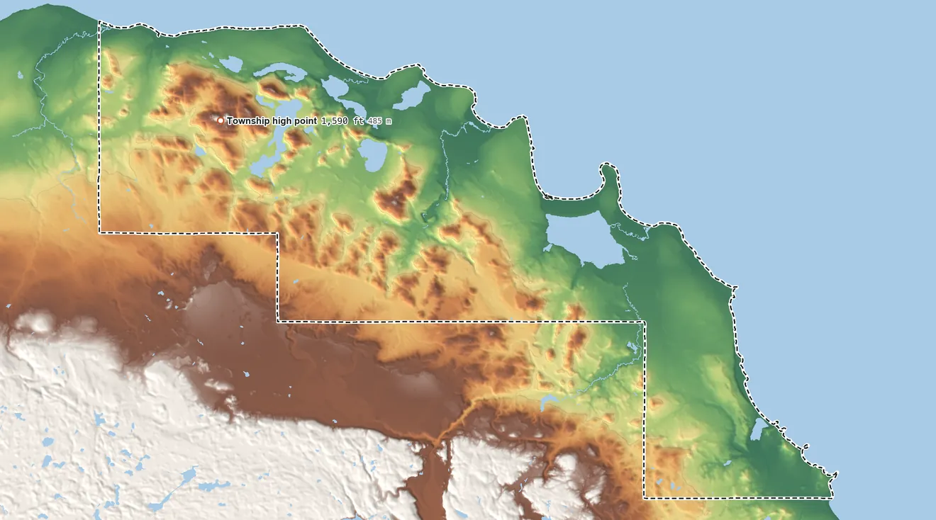 Topographic elevation map of Powell Township, Michigan, shaded from 600 ft on the northwest side to 1,590 ft on Mount Benison