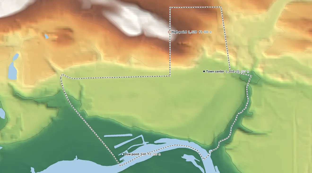 Topographic elevation map of Quinnesec, Michigan, shaded from 940 ft on the southwest side to 1,320 ft on the northwest side
