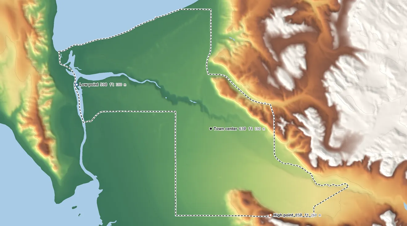 Topographic elevation map of Rapid City, Michigan, shaded from 590 ft on the west side to 850 ft on the southeast side