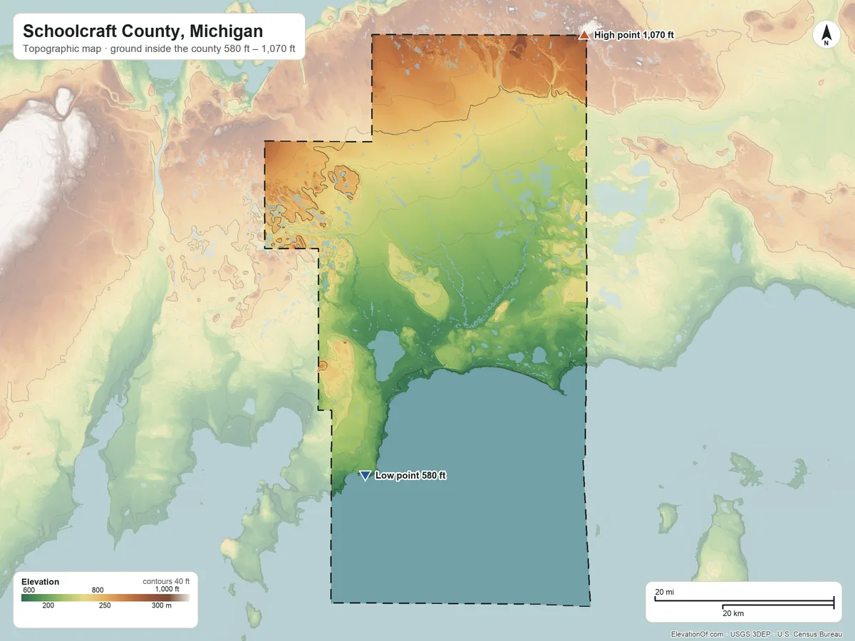 Topographic elevation map of Schoolcraft County, Michigan, shaded from 580 ft on the shore of Lake Michigan to 1,070 ft on the northeast side