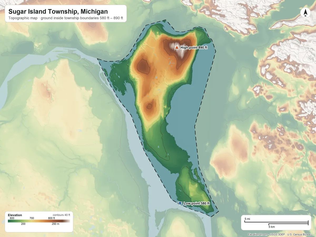 Topographic elevation map of Sugar Island Township, Michigan, shaded from 580 ft on the south side to 890 ft on the north side