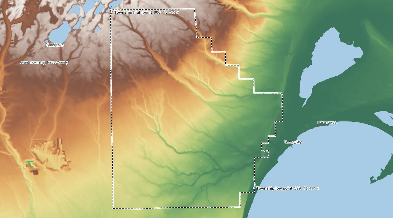 Topographic elevation map of Tawas Township, Michigan, shaded from 590 ft on the southeast side to 800 ft on the northwest side