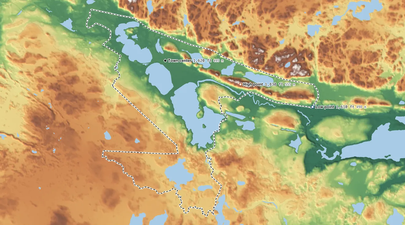 Topographic elevation map of Three Lakes, Michigan, shaded from 1,610 ft on the east side to 1,830 ft on the east side
