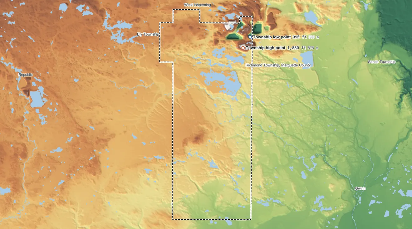 Topographic elevation map of Tilden Township, Michigan, shaded from 990 ft on the east side to 1,880 ft on the east side