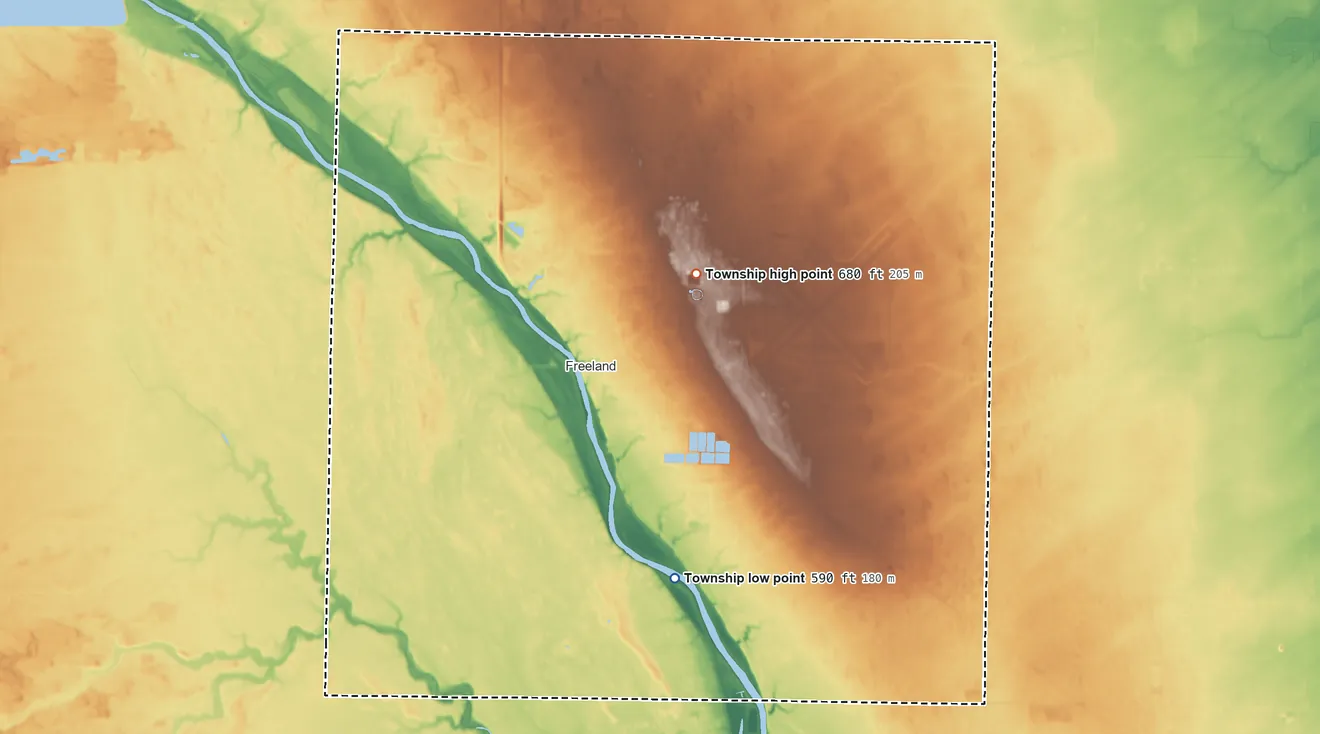 Topographic elevation map of Tittabawassee Township, Michigan, shaded from 590 ft on the south side to 680 ft on the northeast side