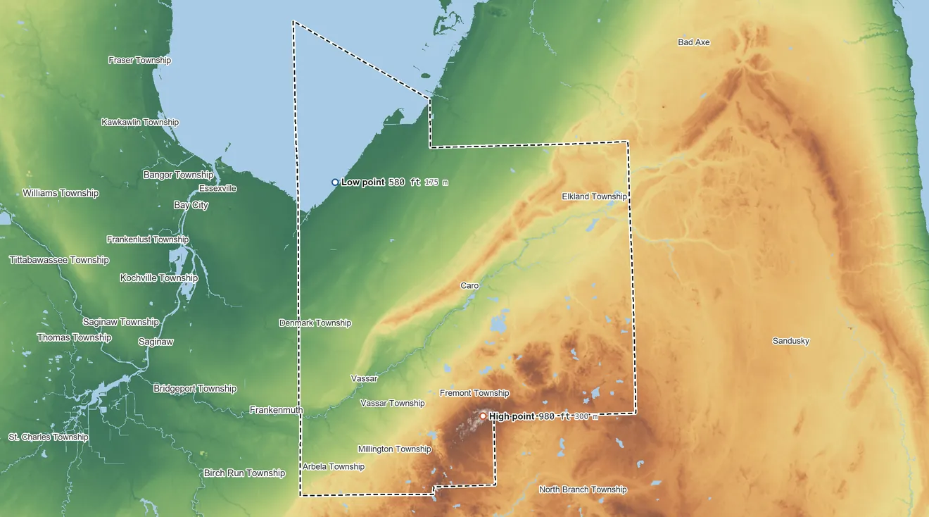 Topographic elevation map of Tuscola County, Michigan, shaded from 580 ft on the northwest side to 980 ft on the south side