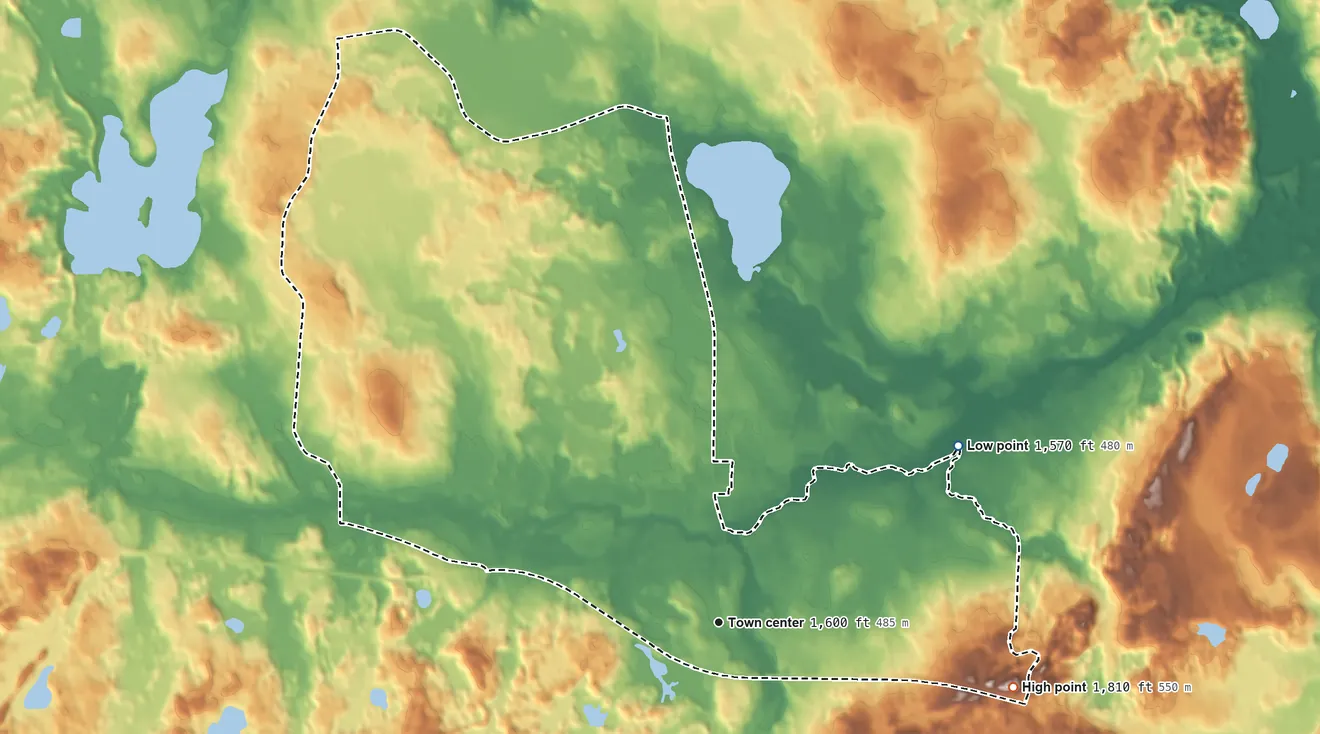 Topographic elevation map of Watersmeet, Michigan, shaded from 1,570 ft on the northeast side to 1,810 ft on the east side
