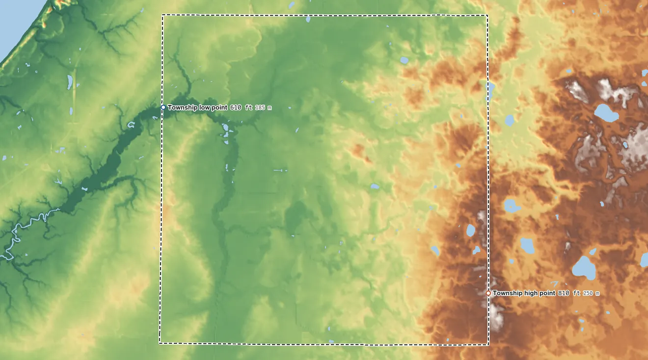 Topographic elevation map of Weesaw Township, Michigan, shaded from 610 ft on the northwest side to 810 ft on the southeast side