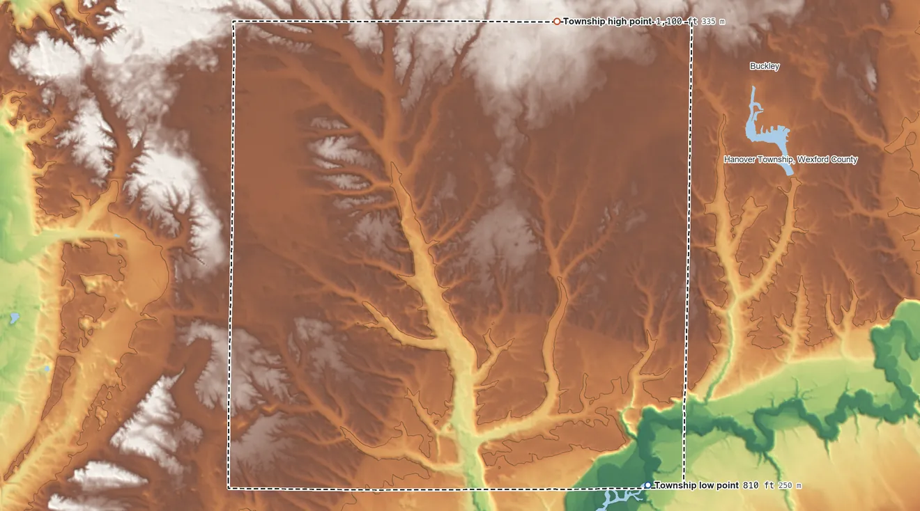 Topographic elevation map of Wexford Township, Michigan, shaded from 810 ft on the southeast side to 1,100 ft on the north side