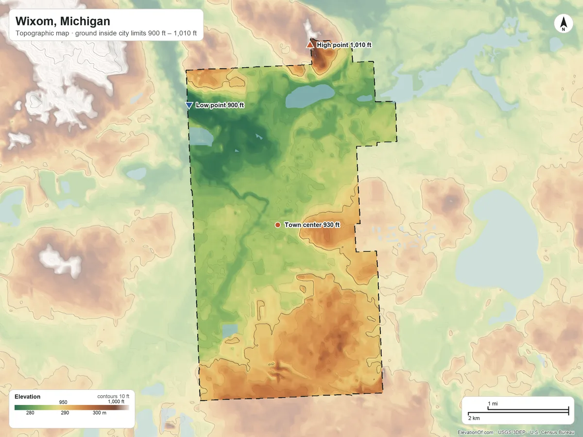 Topographic elevation map of Wixom, Michigan, shaded from 900 ft on the northwest side to 1,010 ft on the north side