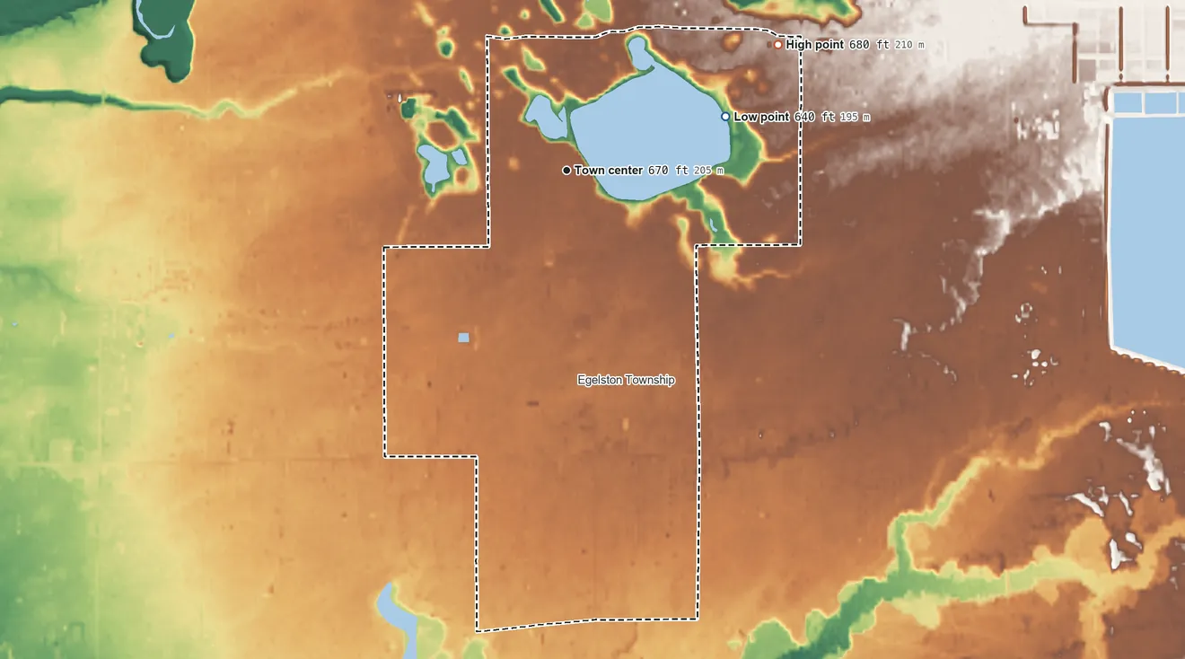 Topographic elevation map of Wolf Lake, Michigan, shaded from 640 ft on the east side to 680 ft on the northeast side
