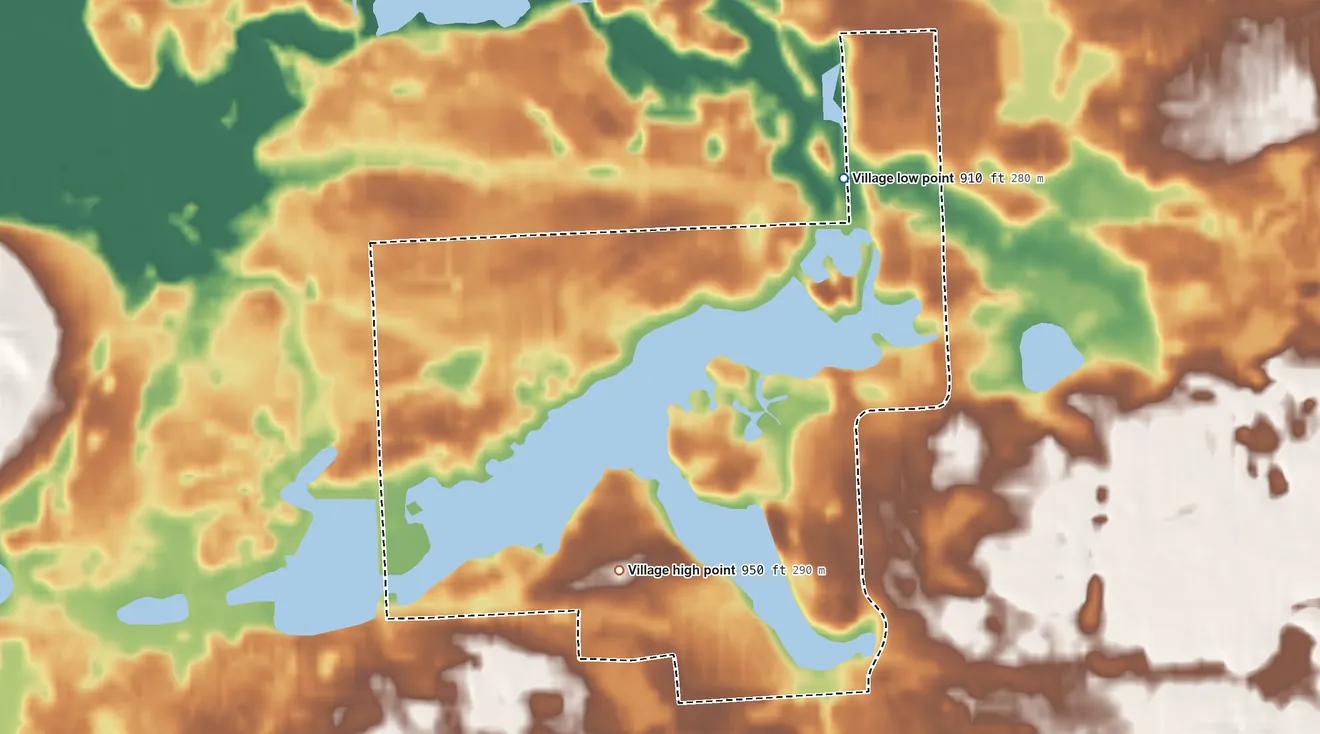 Topographic elevation map of Wolverine Lake, Michigan, shaded from 910 ft on the northeast side to 950 ft on the southwest side