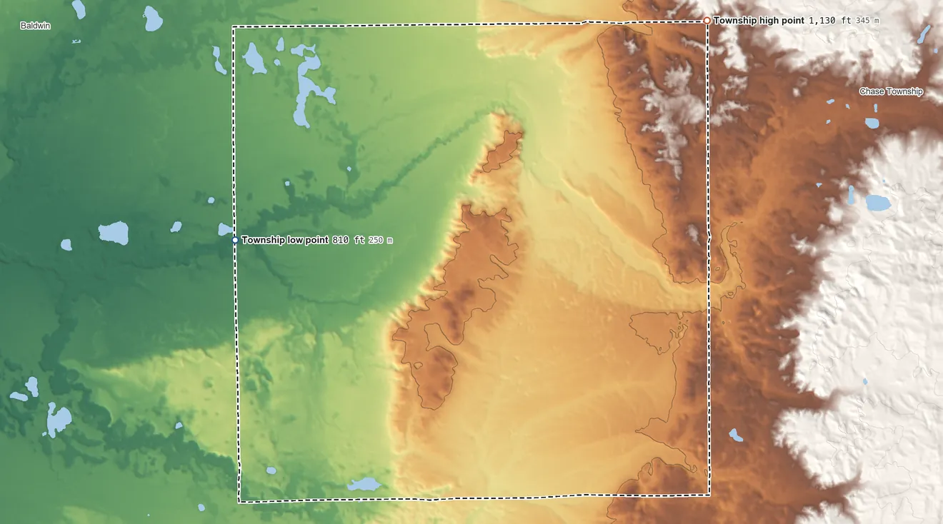 Topographic elevation map of Yates Township, Michigan, shaded from 810 ft on the southwest side to 1,130 ft on the east side