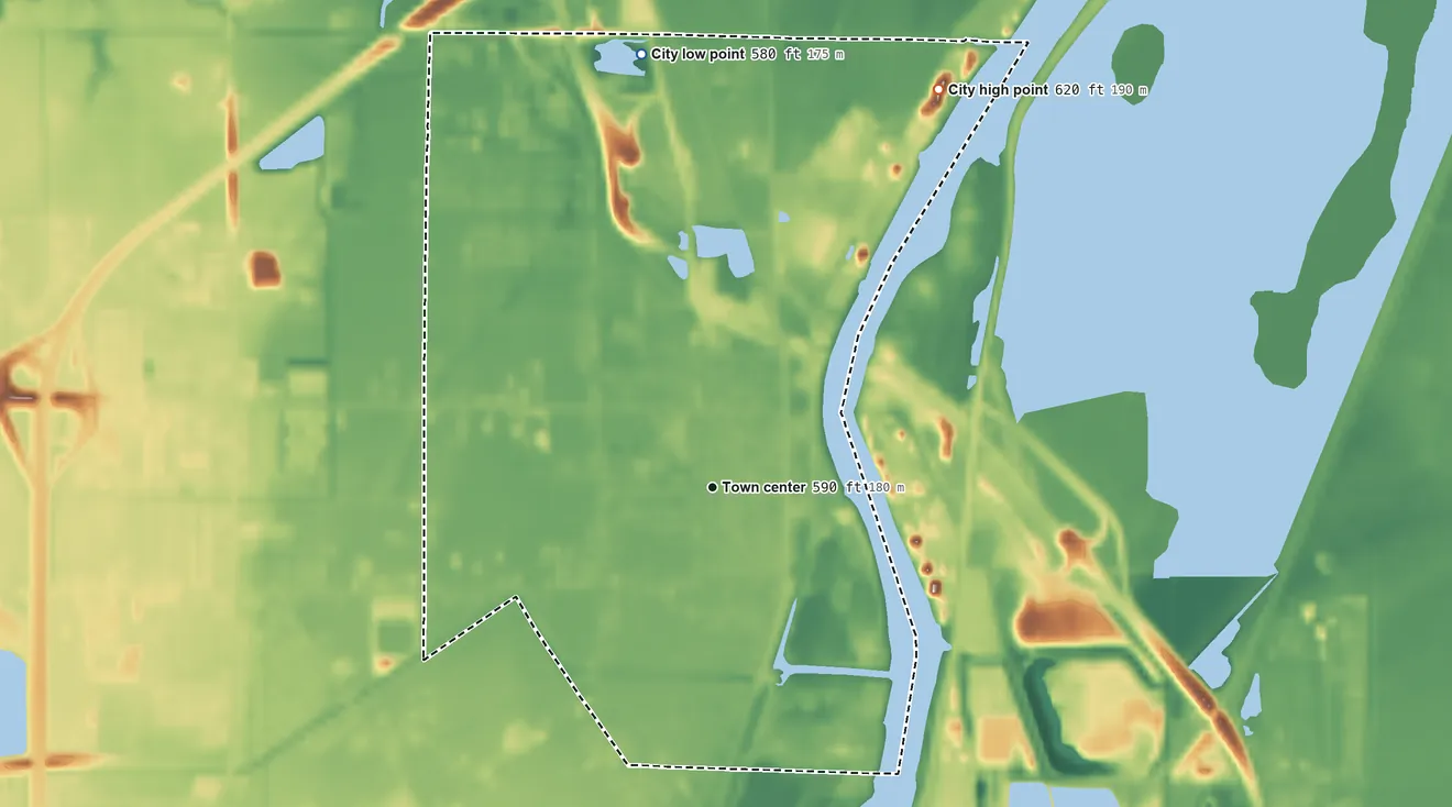 Topographic elevation map of Zilwaukee, Michigan, shaded from 580 ft on the north side to 620 ft on the northeast side