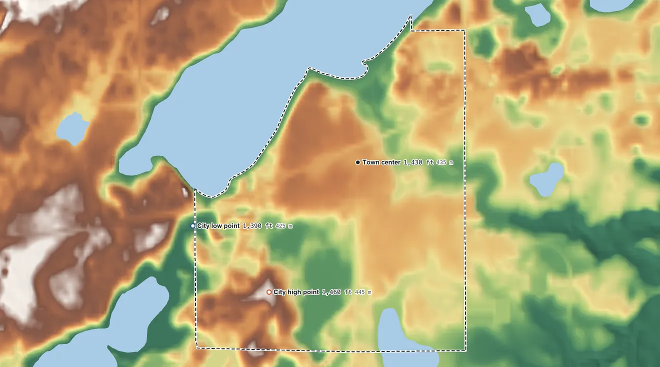 Topographic elevation map of Akeley, Minnesota, shaded from 1,390 ft on the west side to 1,460 ft on the southwest side