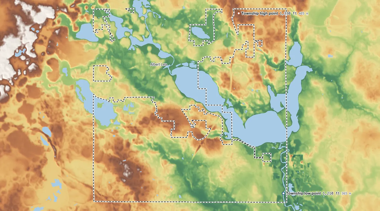 Topographic elevation map of Albert Lea Township, Minnesota, shaded from 1,210 ft on the southeast side to 1,330 ft on the northeast side