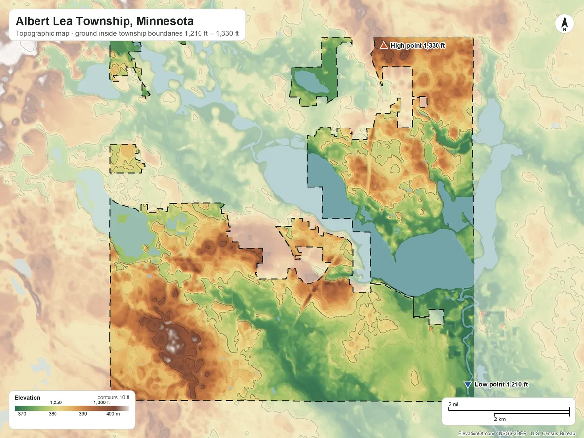 Topographic elevation map of Albert Lea Township, Minnesota, shaded from 1,210 ft on the southeast side to 1,330 ft on the northeast side