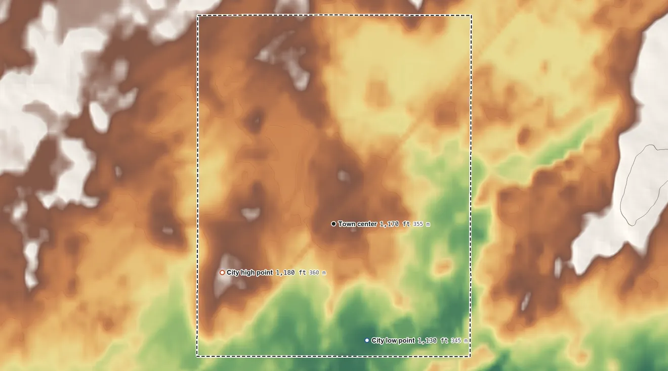 Topographic elevation map of Askov, Minnesota, shaded from 1,130 ft on the south side to 1,180 ft on the southwest side