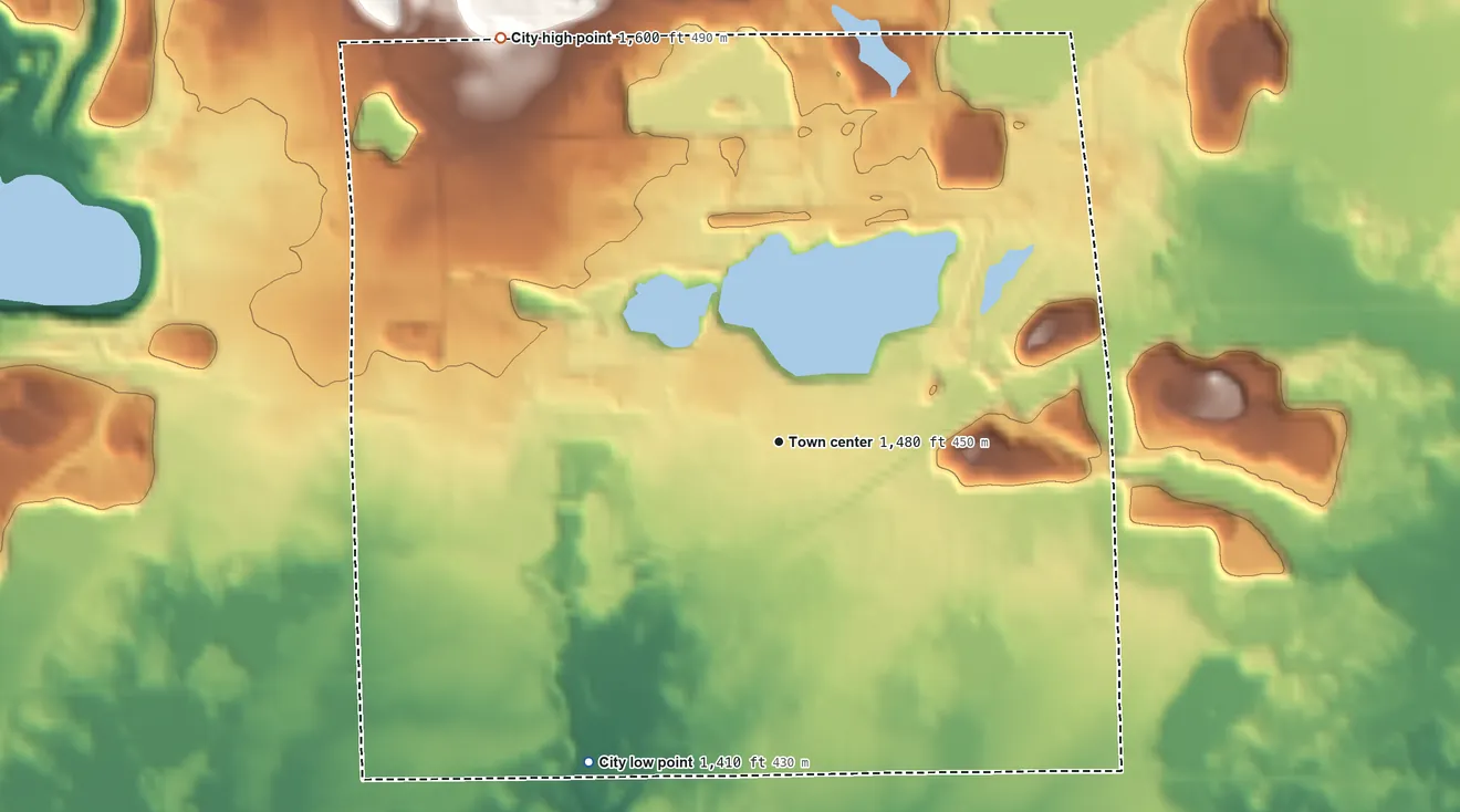 Topographic elevation map of Aurora, Minnesota, shaded from 1,410 ft on the southwest side to 1,600 ft on the northwest side