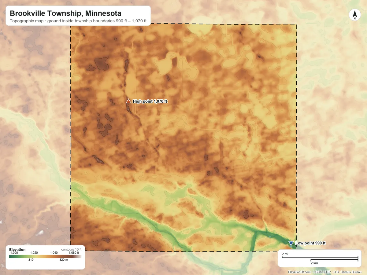 Topographic elevation map of Brookville Township, Minnesota, shaded from 990 ft on the southeast side to 1,070 ft on the northwest side