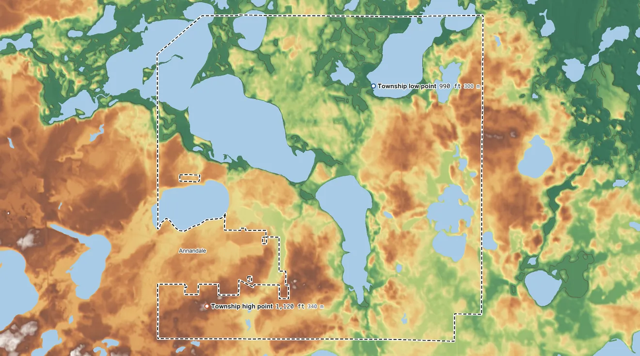 Topographic elevation map of Corinna Township, Minnesota, shaded from 990 ft on the north side to 1,120 ft on the southwest side