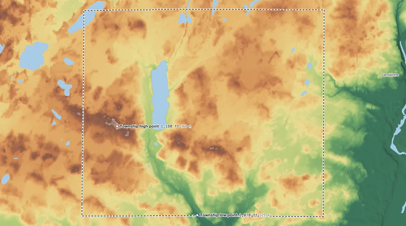 Topographic elevation map of Dell Grove Township, Minnesota, shaded from 1,070 ft on the south side to 1,180 ft on the west side