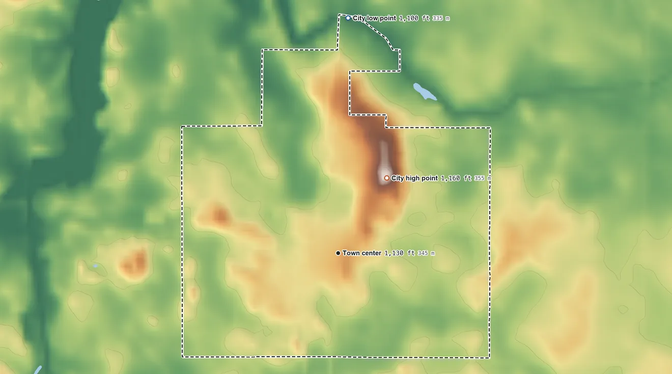 Topographic elevation map of Elmore, Minnesota, shaded from 1,100 ft on the north side to 1,160 ft on the northeast side