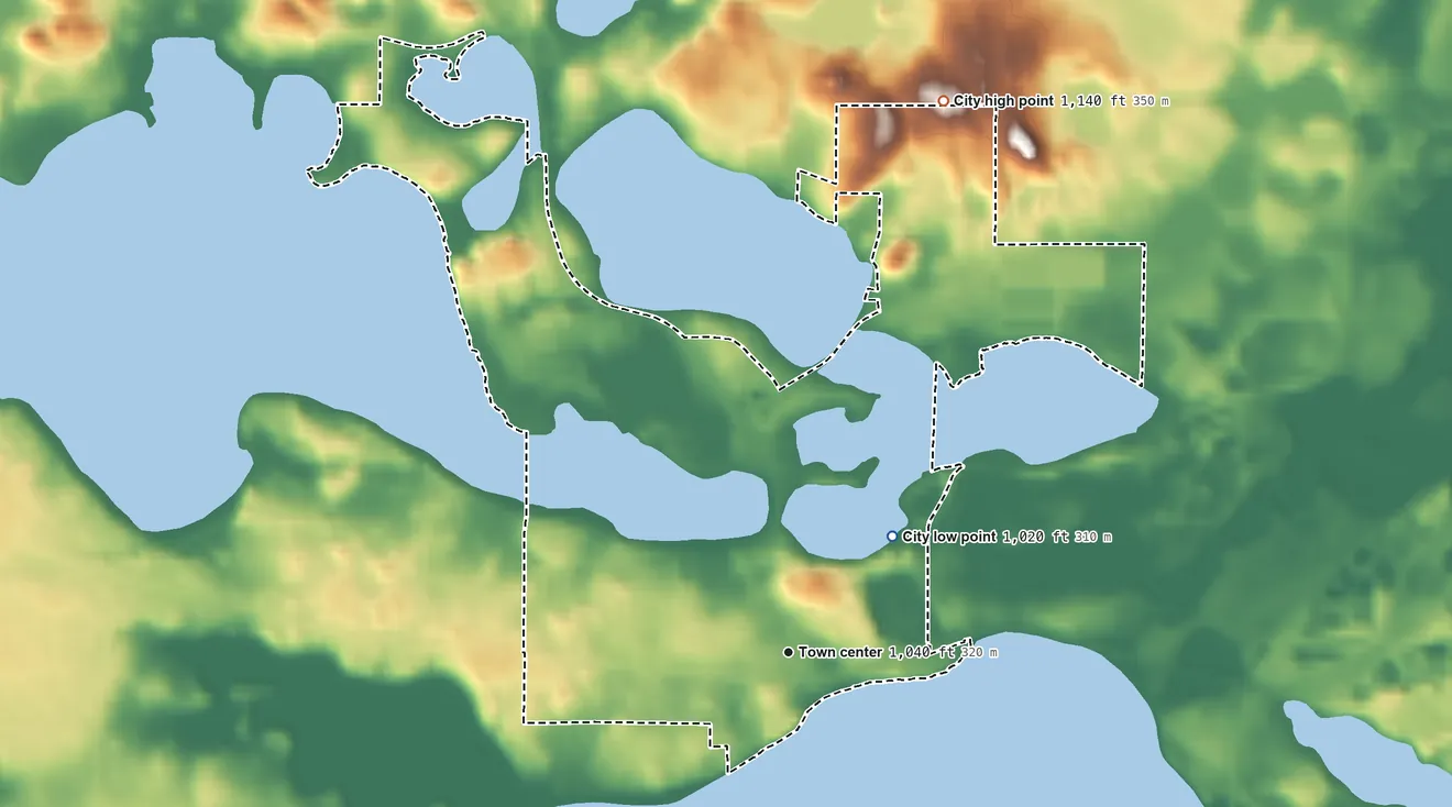 Topographic elevation map of Elysian, Minnesota, shaded from 1,020 ft on the northeast side to 1,140 ft on the north side