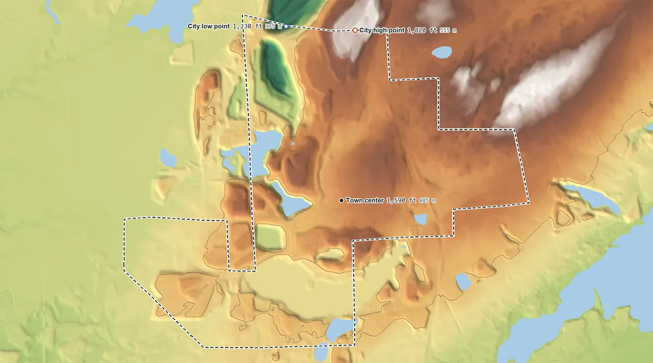 Topographic elevation map of Eveleth, Minnesota, shaded from 1,230 ft on the north side to 1,820 ft on the north side