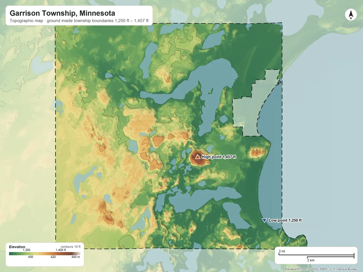 Topographic elevation map of Garrison Township, Minnesota, shaded from 1,250 ft on the southeast side to 1,457 ft on Warren Hill