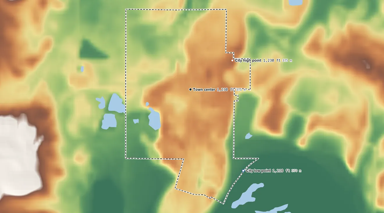 Topographic elevation map of Geneva, Minnesota, shaded from 1,210 ft on the southeast side to 1,230 ft on the northeast side