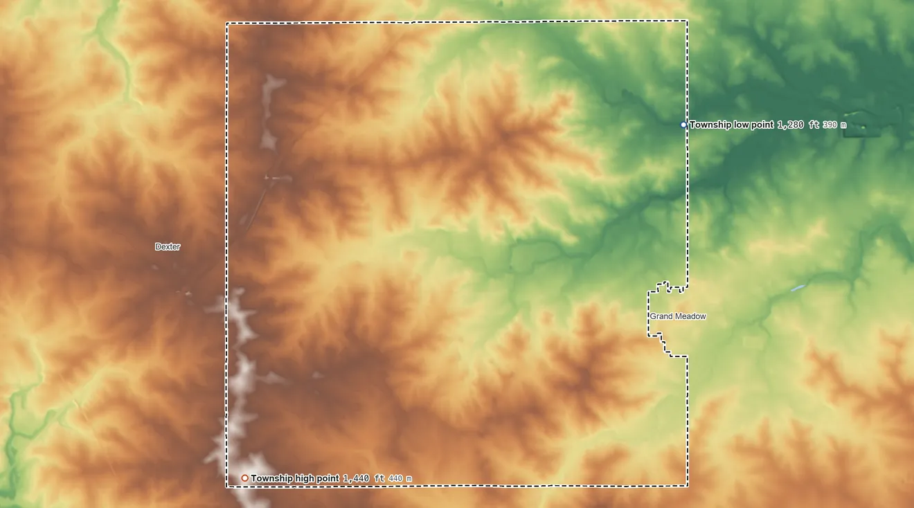 Topographic elevation map of Grand Meadow Township, Minnesota, shaded from 1,280 ft on the northeast side to 1,440 ft on the southwest side