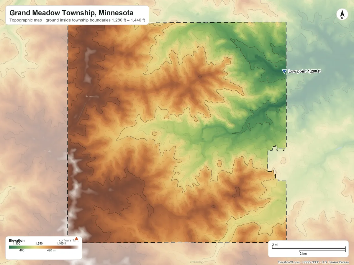 Topographic elevation map of Grand Meadow Township, Minnesota, shaded from 1,280 ft on the northeast side to 1,440 ft on the southwest side