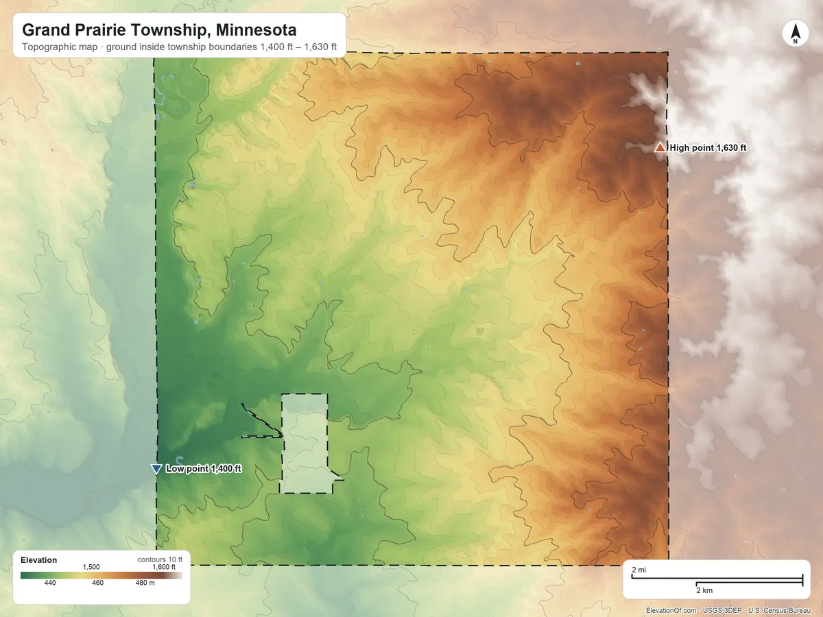 Topographic elevation map of Grand Prairie Township, Minnesota, shaded from 1,400 ft on the southwest side to 1,630 ft on the northeast side