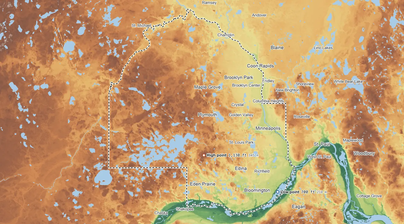 Topographic elevation map of Hennepin County, Minnesota, shaded from 700 ft on the southeast side to 1,130 ft on the south side